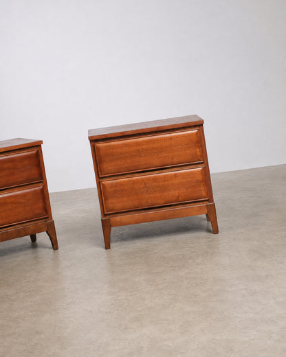 Side view of a walnut nightstand showing depth and tapered leg profile.
