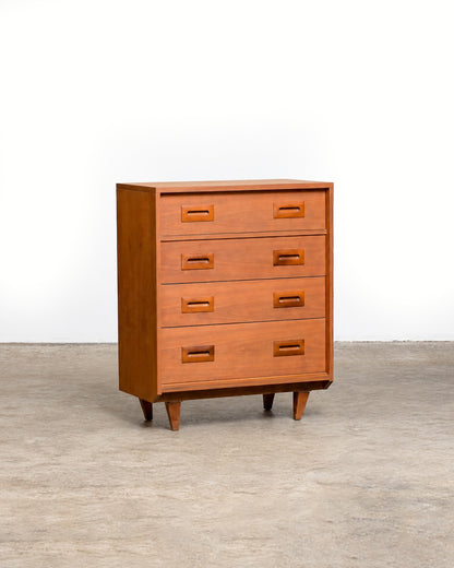 Additional angle of the tallboy dresser highlighting the case proportions and drawer stack.