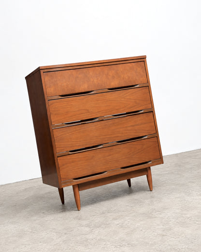 Close-up of the dresser's top surface and front edge detailing.