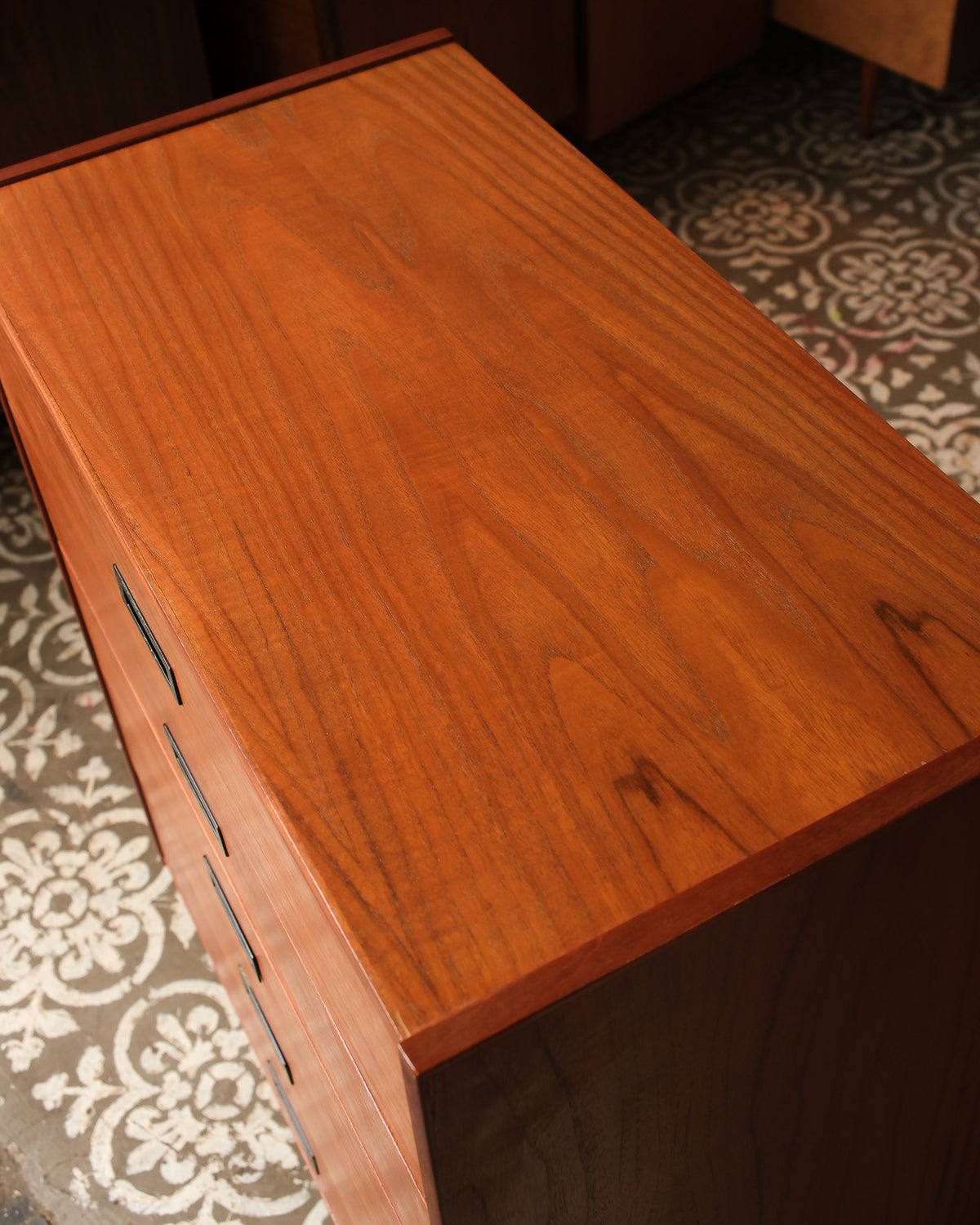 Overhead view of the teak top surface showing wood grain pattern.