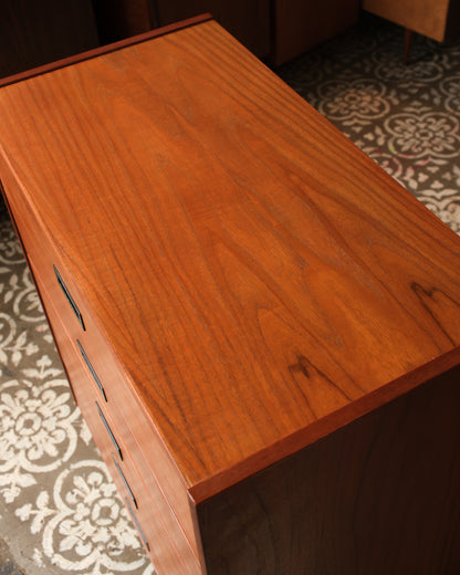Overhead view of the teak top surface showing wood grain pattern.