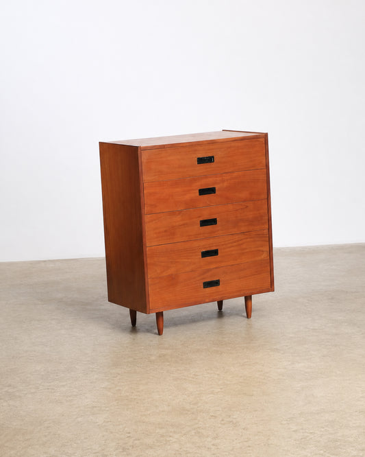 Three-quarter view of the tallboy dresser against a plain studio background.