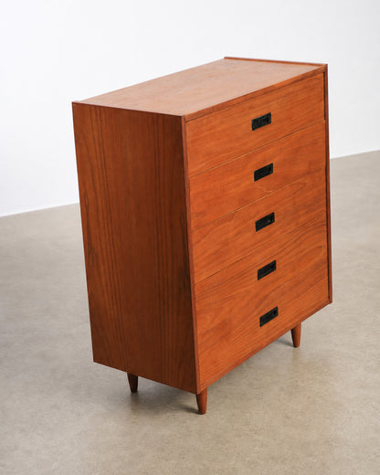 Detail of the tapered wood legs and base construction.