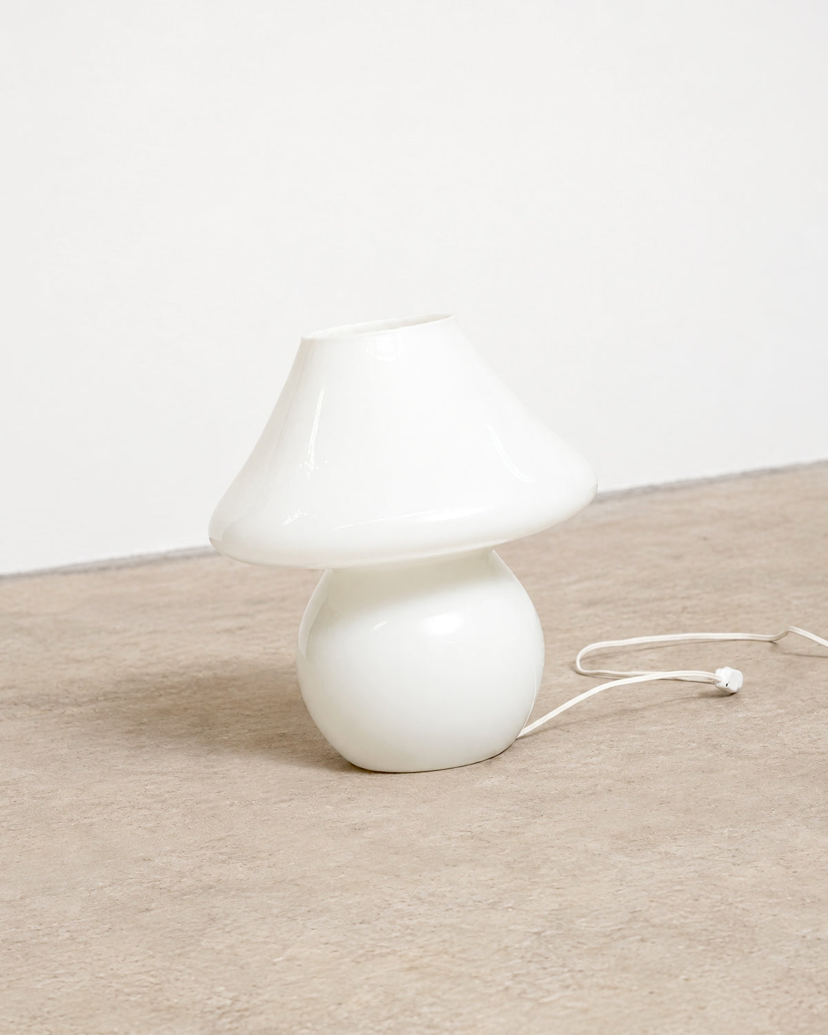 Murano mushroom lamp shown against a plain background with its cord and plug visible.