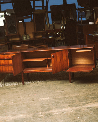 Interior view with both cabinet doors open, revealing an adjustable shelf and storage compartments.