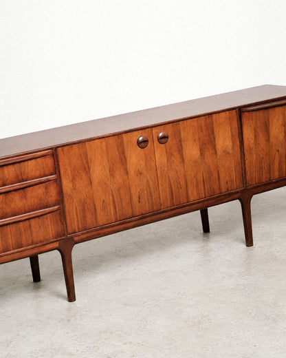 View of the sideboard top showing the rosewood veneer and edge detailing.