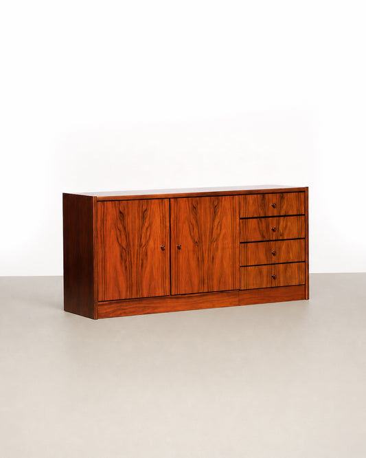 Detail of the cabinet door grain pattern and knob hardware.