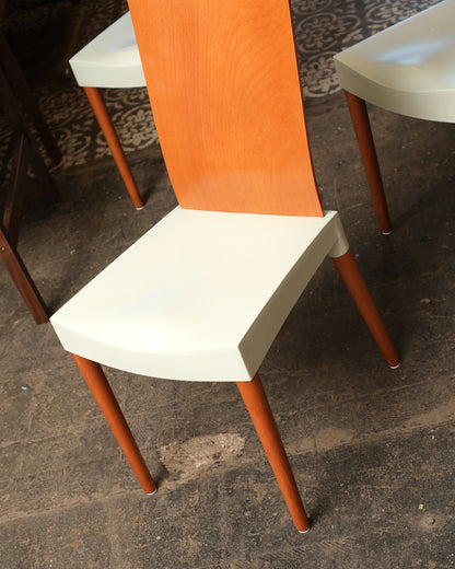 Overhead view of a Miss Trip chair seat and back joint, showing the bentwood grain and leg attachment.
