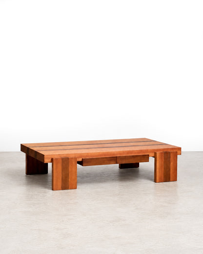 Front view of the coffee table showing its low profile and two built-in drawers.