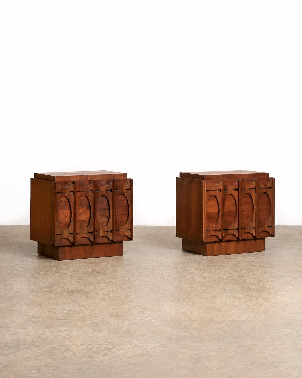 Tobago Brutalist dark walnut nightstand set on a plain white background — bold architectural forms and sculptural detailing