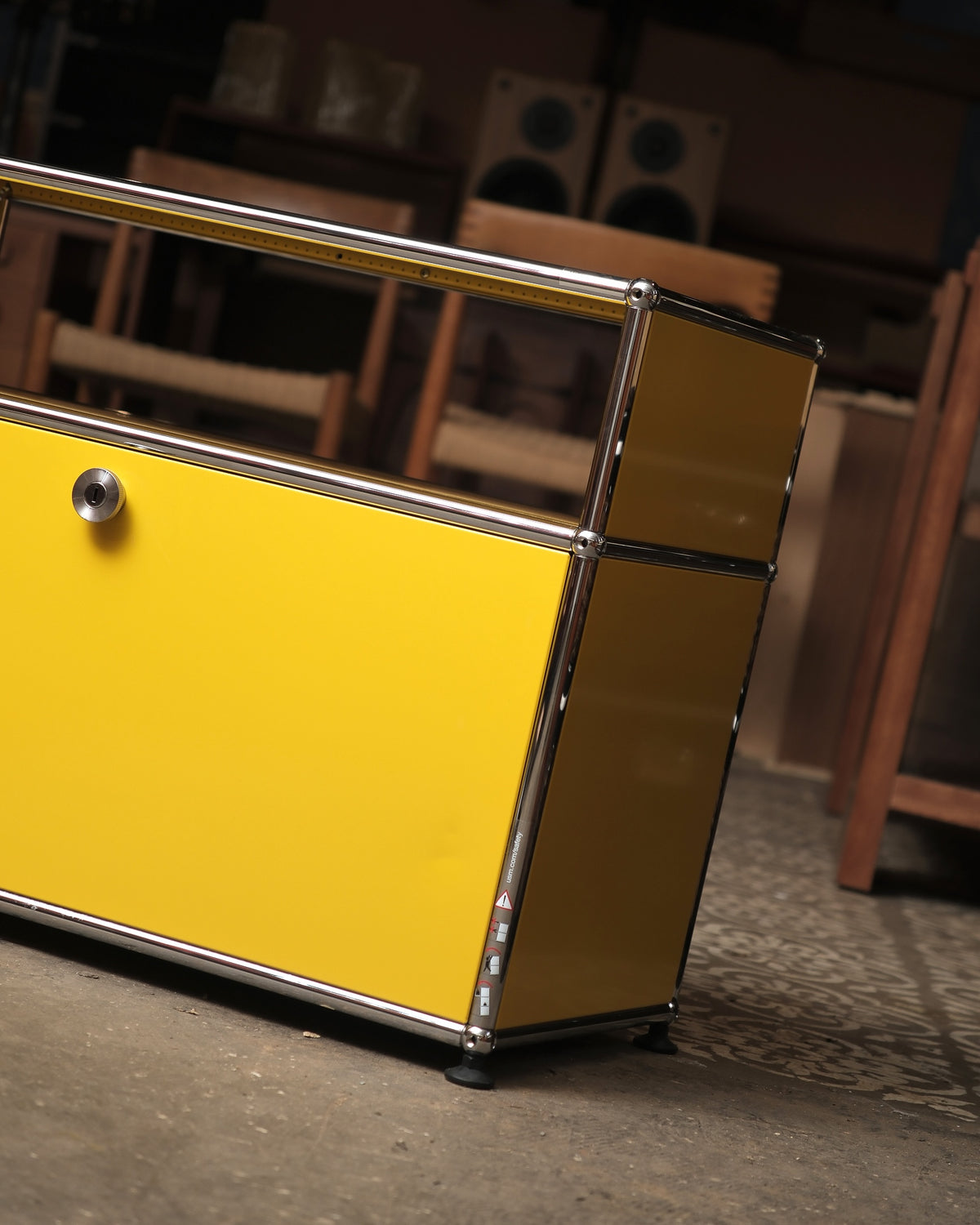 View of the cabinet door closed, showing lock and panel seams.