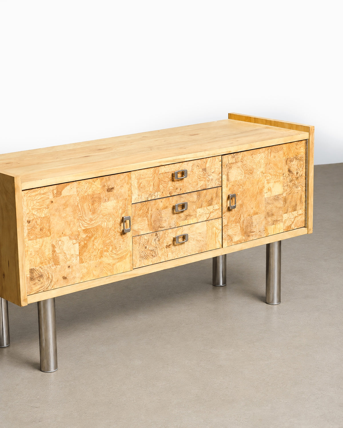 View of the sideboard's back corner construction and wood edge banding.
