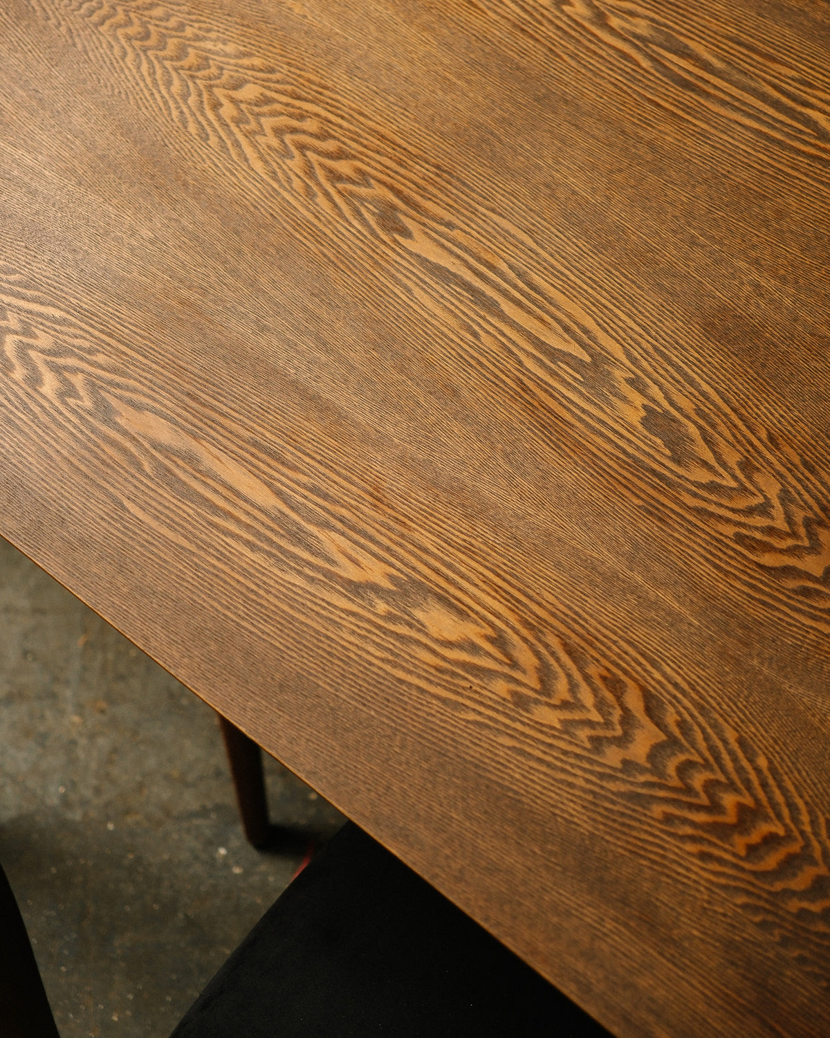 Close-up detail of the tabletop grain pattern and finish.