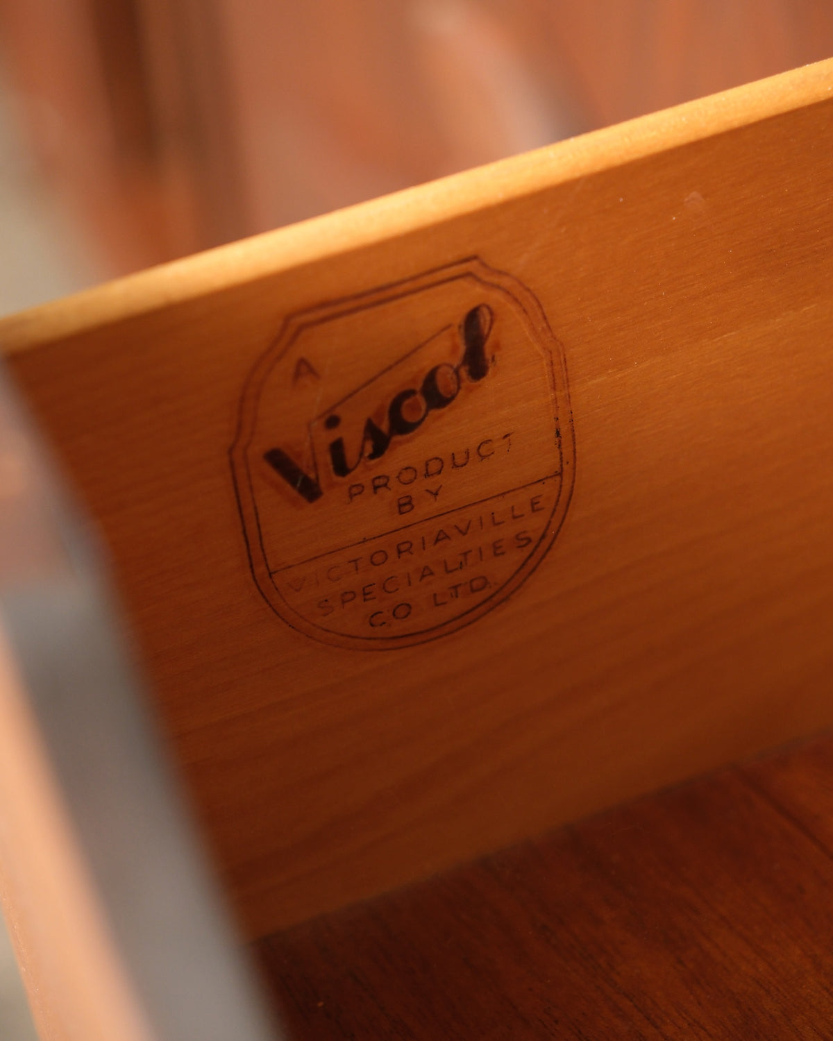 Close-up of the Viscol Product by Victoriaville Specialties Co. Ltd. maker's stamp inside a drawer