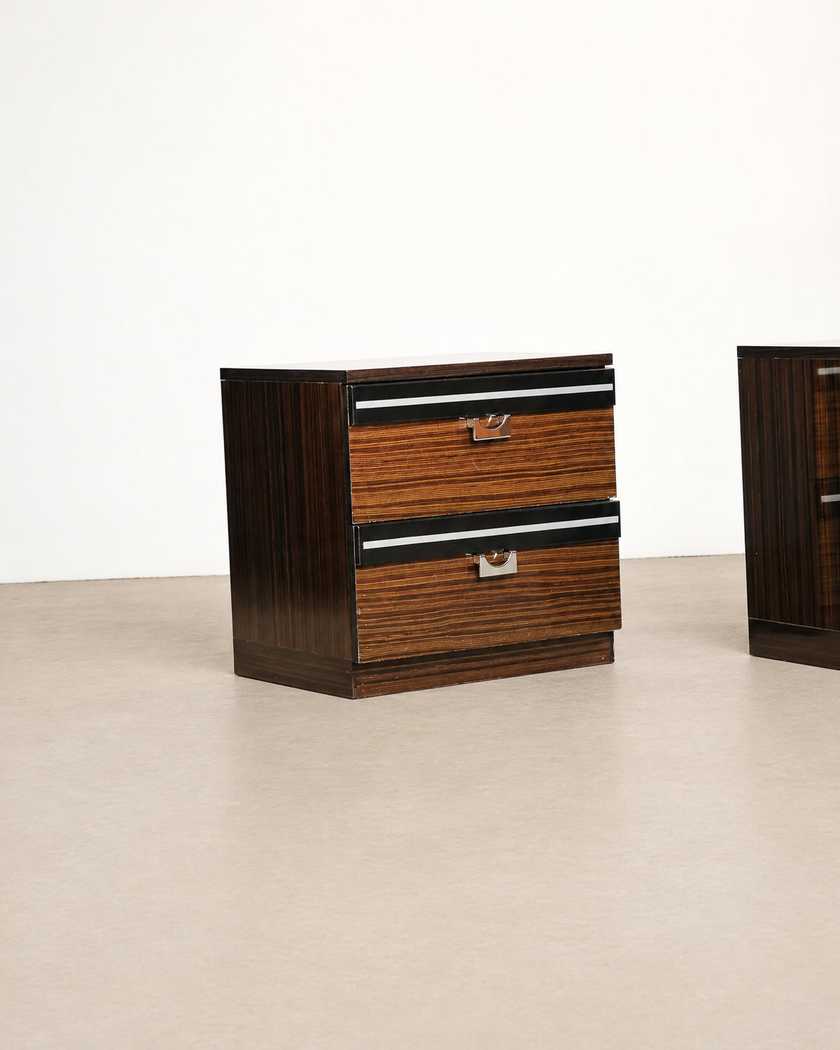 Detail of the base and bottom edge banding of the nightstand.