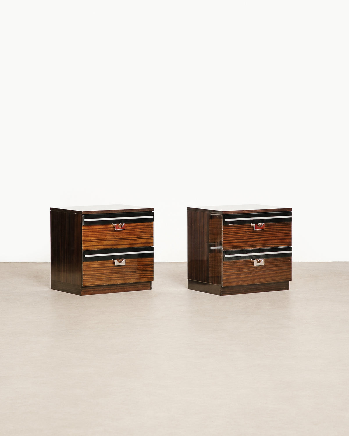 Wide shot of the nightstand set in the shop showing scale relative to nearby furniture.